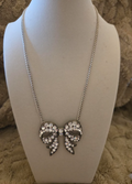 Crystal Pave Bow Pendant Necklace – Silver Chain