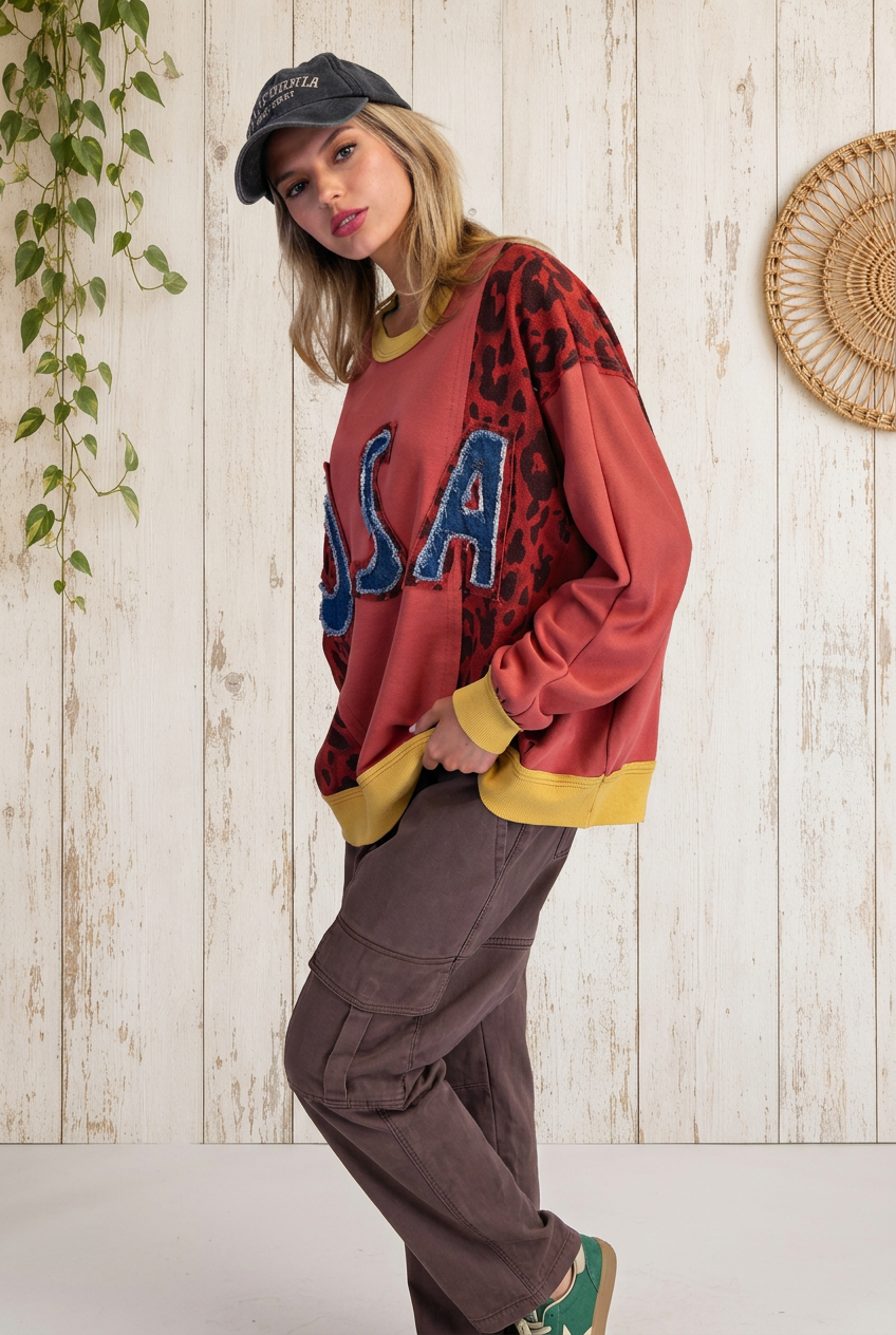 Close-up sweatshirt preview with light wood backdrop