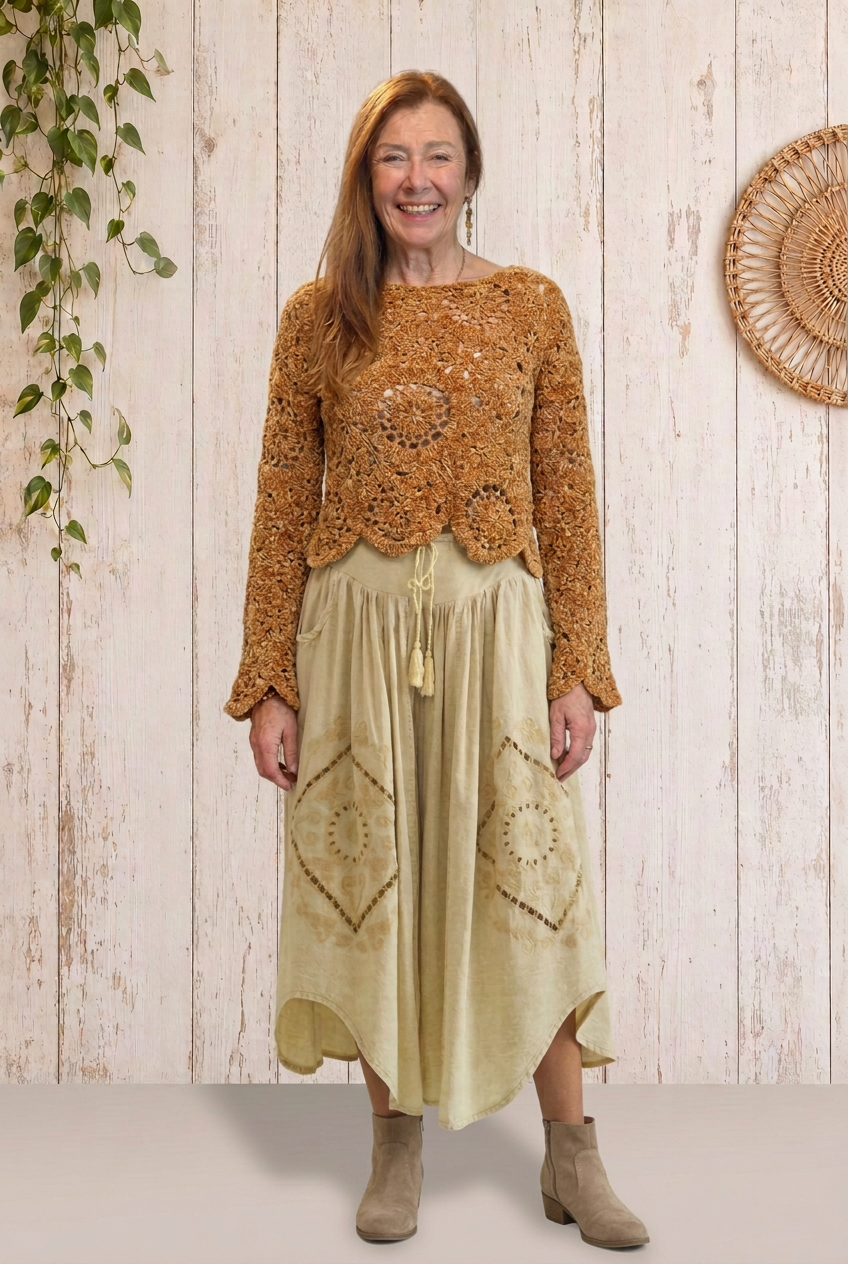 Dee’s outfit with neutral taupe booties