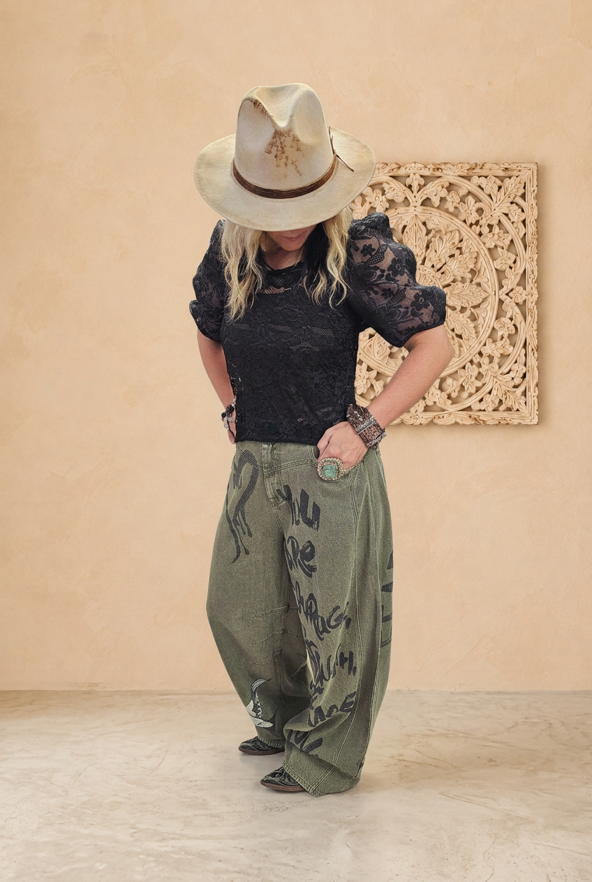 First outfit view with beige backdrop