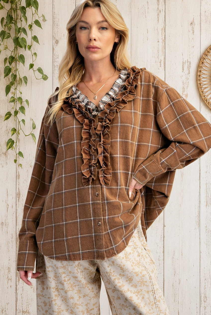 Hand-on-hip pose with whitewashed wood backdrop