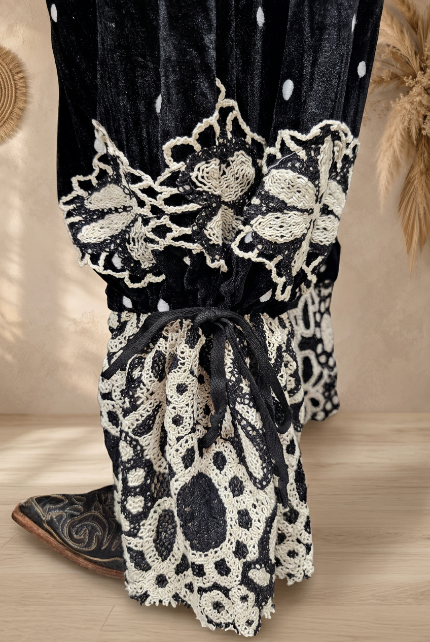 Lace pant detail with neutral beige background