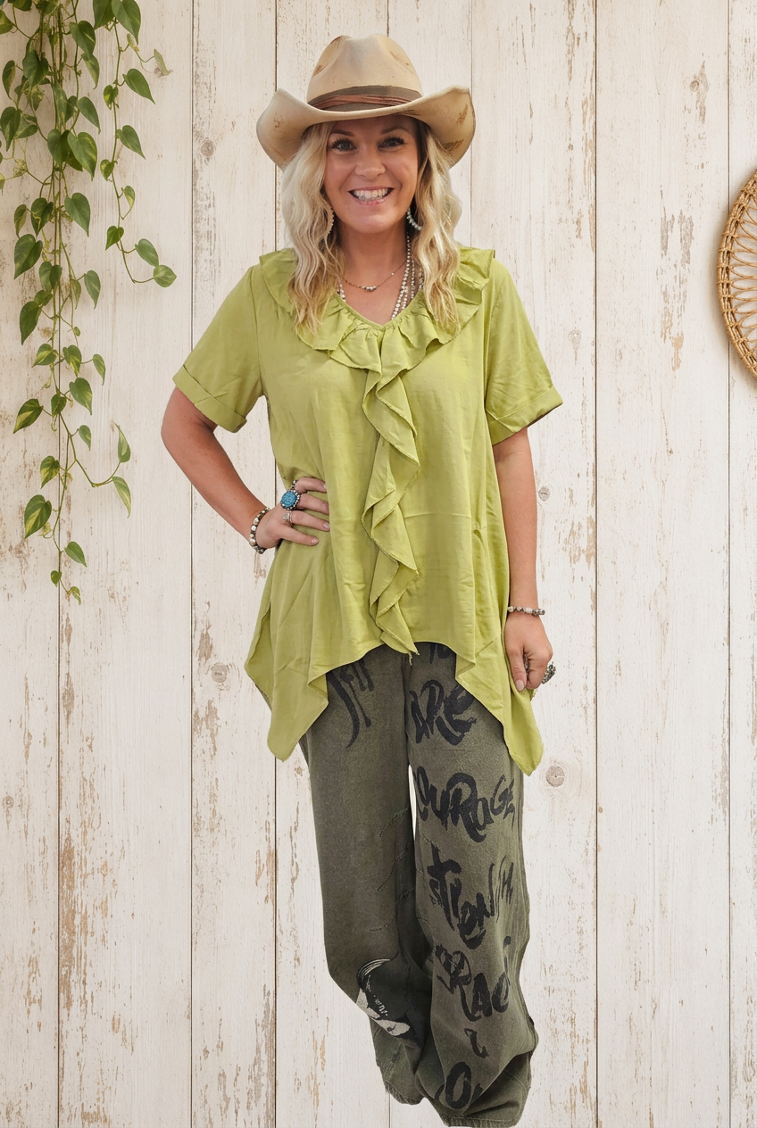 Model wearing olive blouse
