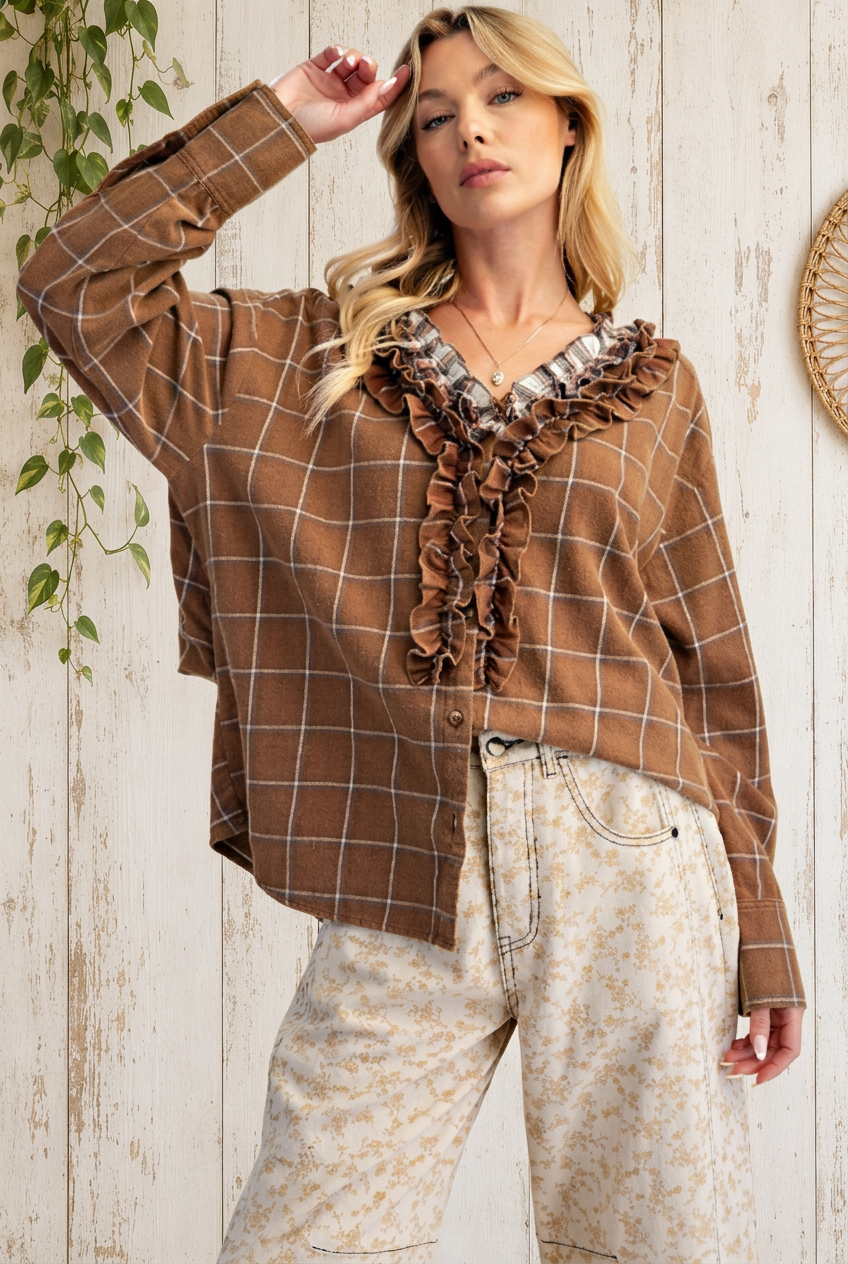Raised-arm pose with whitewashed wood backdrop