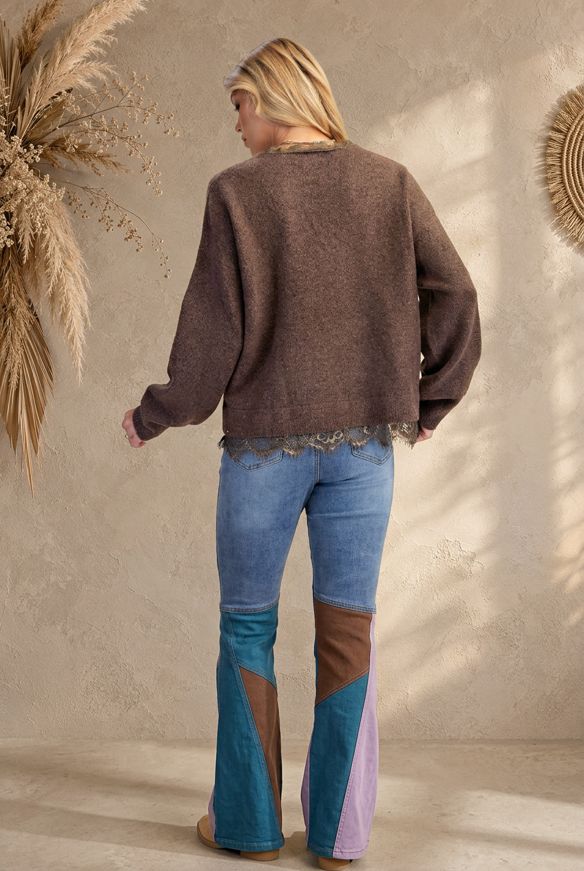 Rear-view sweater preview with sunlit beige backdrop