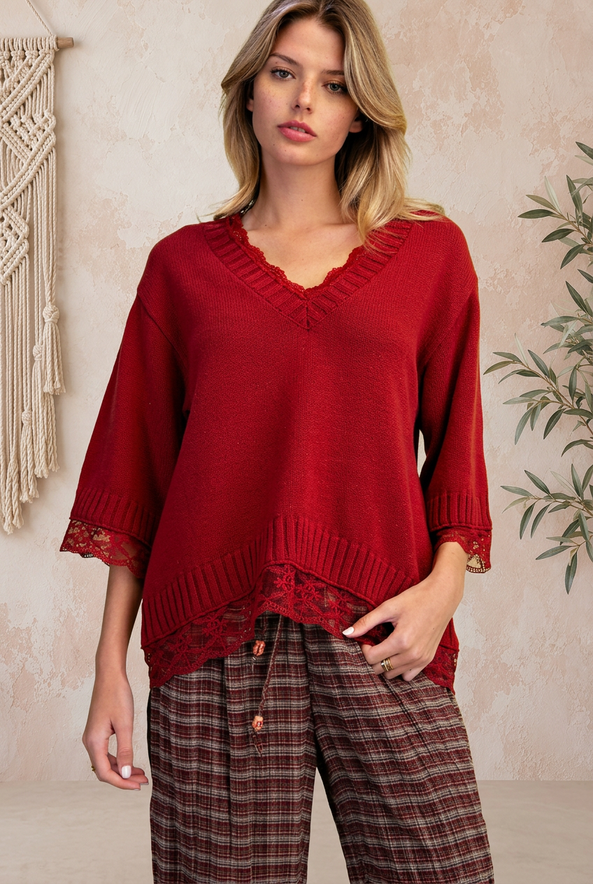 Red top close-up with beige backdrop